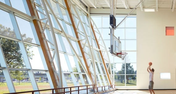 A man playing basketball in the Chuck Bailey Recreation Center