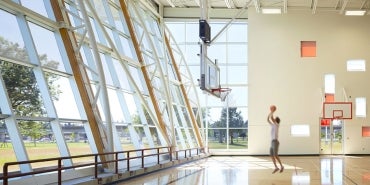 Man Playing Basketball at the Chuck Bailey Recreation Center