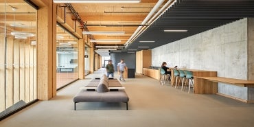 An interior image of the CNL Science Collaboration Center featuring mass timber