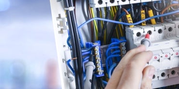 Commissioning Engineering working with electrical wiring