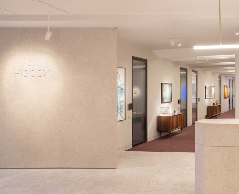 Interior of Hiscox office at 22 Bishopsgate London. Corridor with doors leading into different meeting rooms.