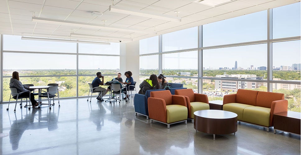 Students and faculty meeting in lounge areas found on every floor of the HCC Coleman Building.