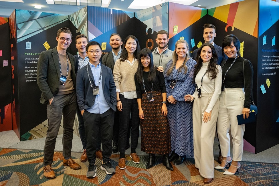 Employees gather at an architecture conference