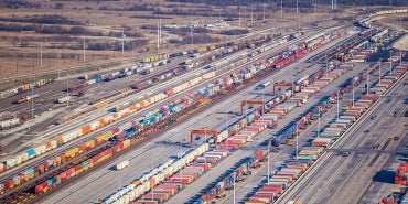 aerial photo of trains in intermodal yard