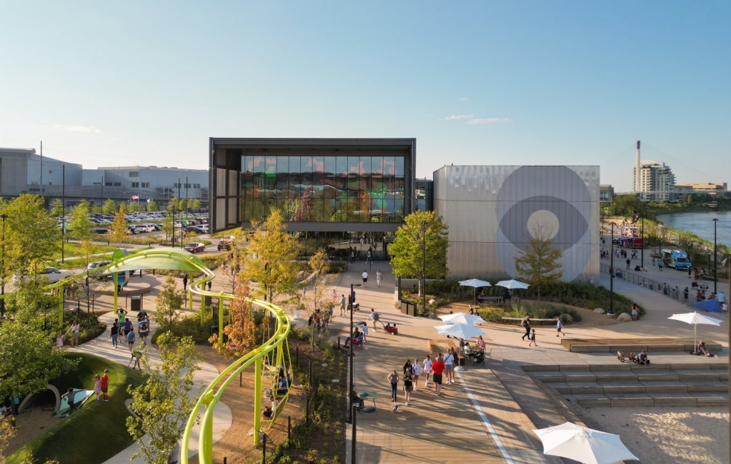 elevated exterior view of Kiewit Luminarium with riverfront park