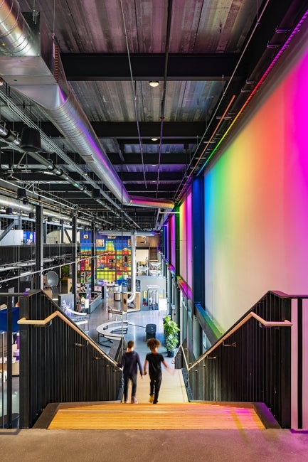 Kiewit Luminarium kids walking down stairs