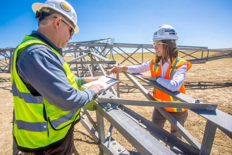 two hdr employees at the gateway west transmission line site