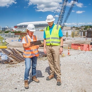 Julie Labonte and Scott Aurit on project site