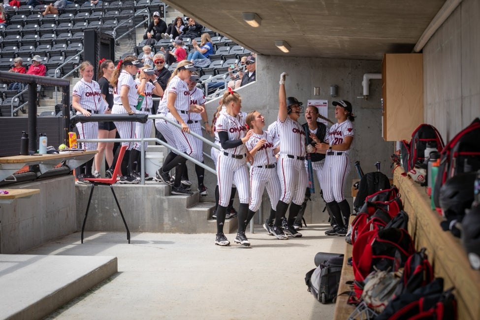 UNO Maverick Park softball dugout with team