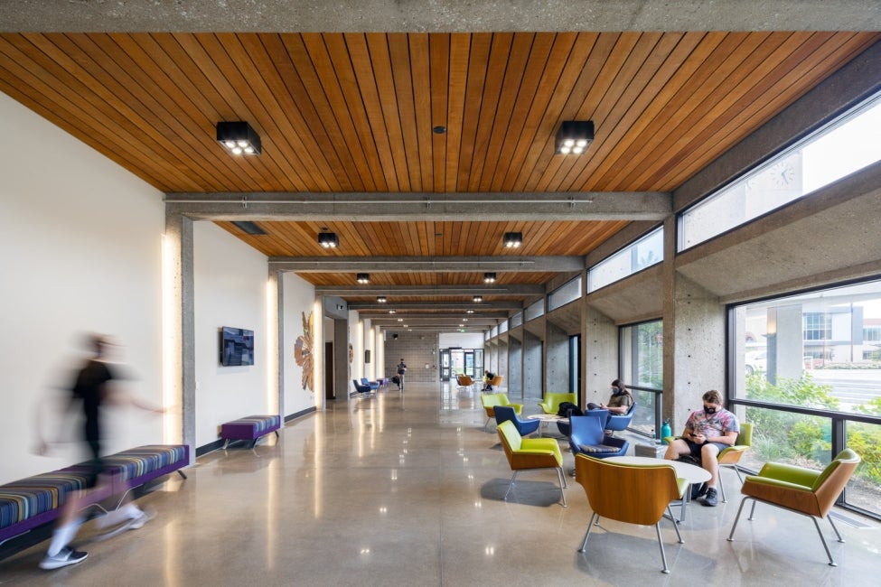 interior hallway view of University of Nebraska's Strauss Performing Arts Center with views to the outside