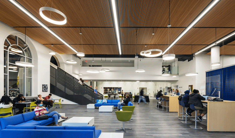 lounge area at CCP's new library and learning commons filled with students