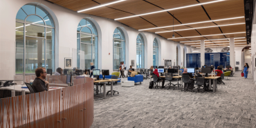 interior view of the reading room filled with students at the community college of Philadelphia new library and learning commons