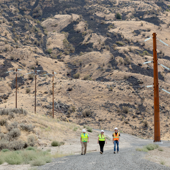 HDR employees walking at Jumpoff Ridge Substation site