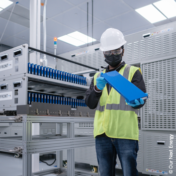 Employee inside ONE Circle Battery Manufacturing Facility