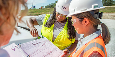 HDR employees reviewing project data