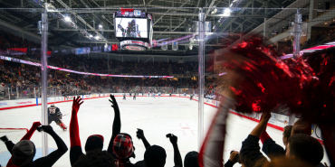 Image of people cheering at the University of Nebraska Baxter Arena