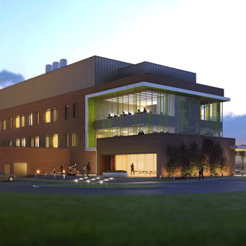 An exterior rendering of the USDA National Grape Innovation Lab Building at night with people meeting in the second floor conference room and pedestrian activity outside.